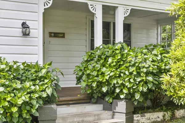 Front entrance and “The Cottage” nameplate