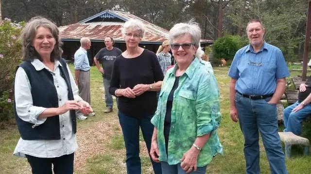 Society visitors in the grounds of the former Balmoral School