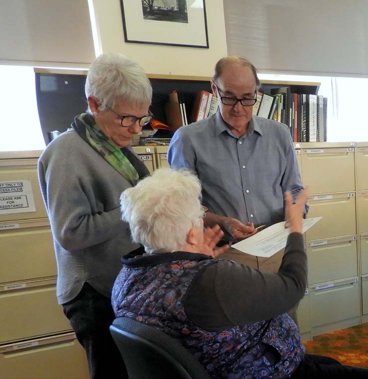 Family History Group members discussing research in 2019