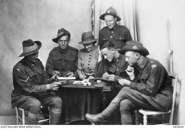 Ettie Rout and soldiers playing cards in Paris