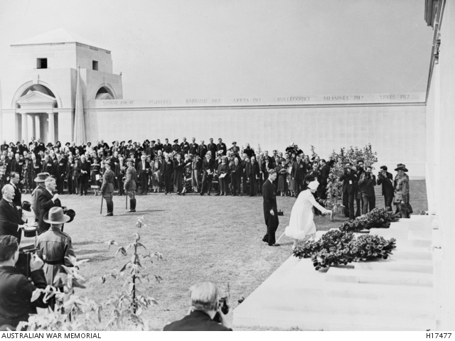 Queen Elizabeth placing flowers at the Australian memorial at Villers-Bretonneux