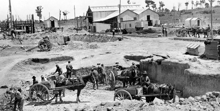 Workers and horses at New Berrima Cement Works during construction