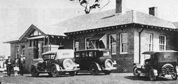 The cement works office with cars outside in 1930