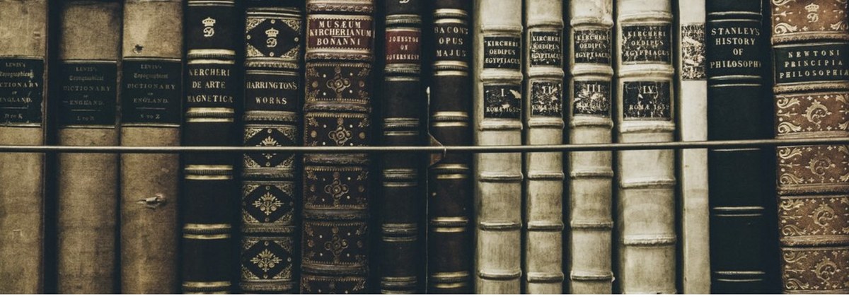 Historic books on shelves.