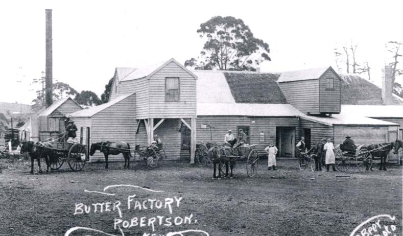 Robertson butter factory with horse-drawn vehicles
