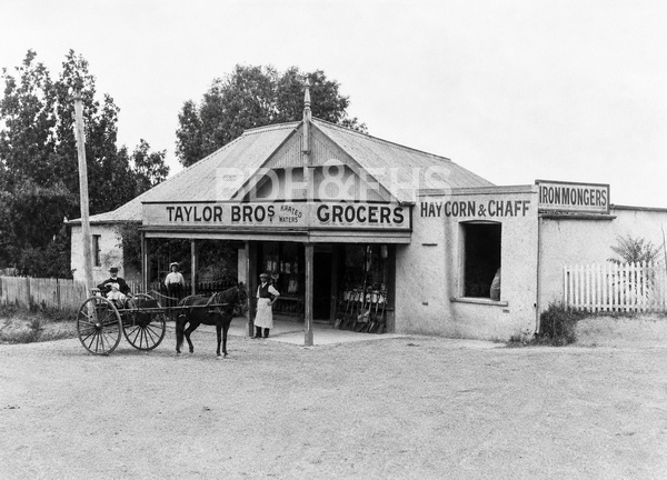 Taylor Bros Store at Sutton Forest around 1910, with people and a sulky outside.