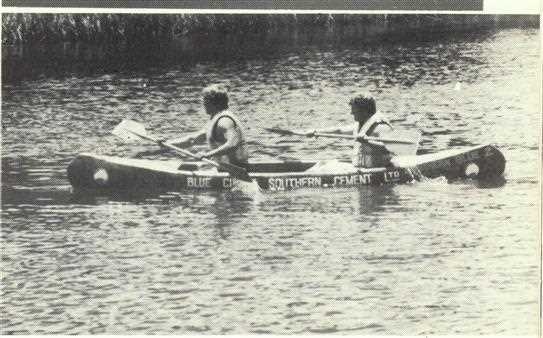Stuart Hervert and John Cooper practising in a concrete canoe on Berrima Weir