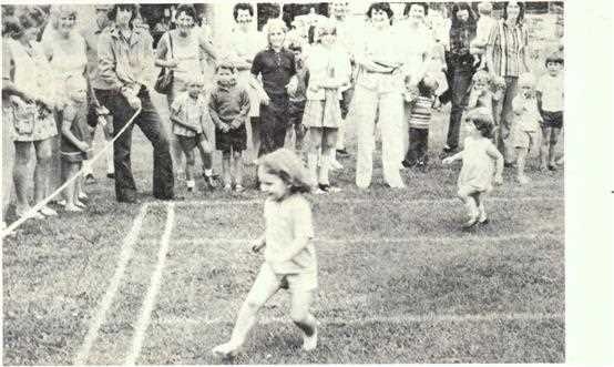 Children racing at a Southern Portland Cement picnic